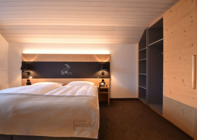 Familienzimmer Deluxe Schlafzimmer | Hotel Laaxerhof