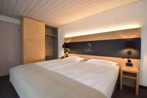 Junior Suite Deluxe Schlafzimmer | Hotel Laaxerhof