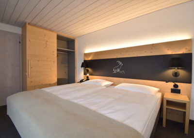 Junior Suite Deluxe Schlafzimmer | Hotel Laaxerhof